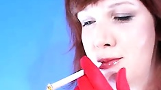 Brunette slut smoking while stripping sexy on cam